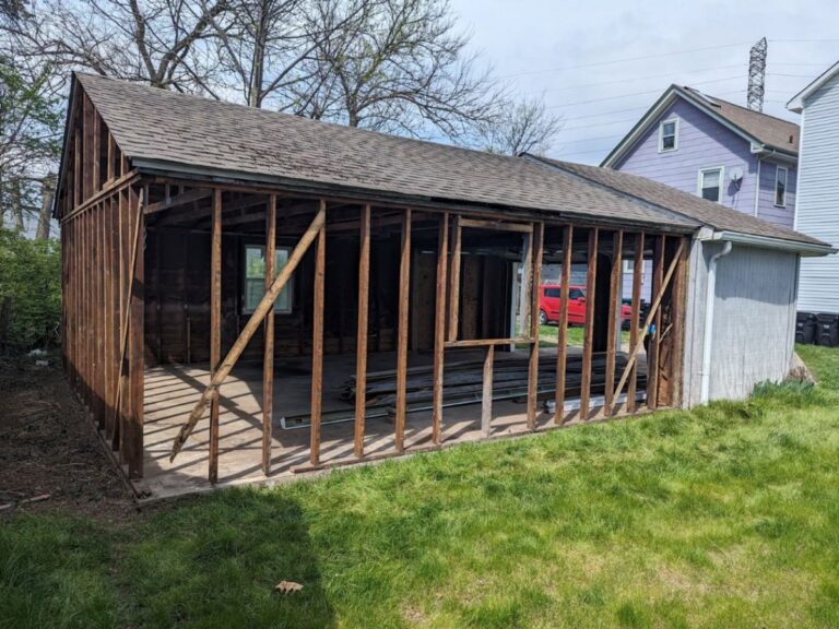 Old Garage Coming Down With Demolition Work